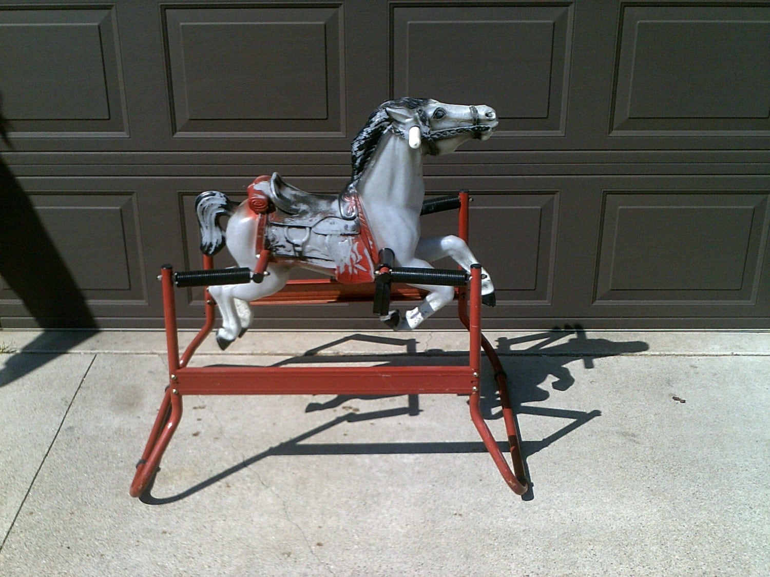 vintage plastic rocking horse