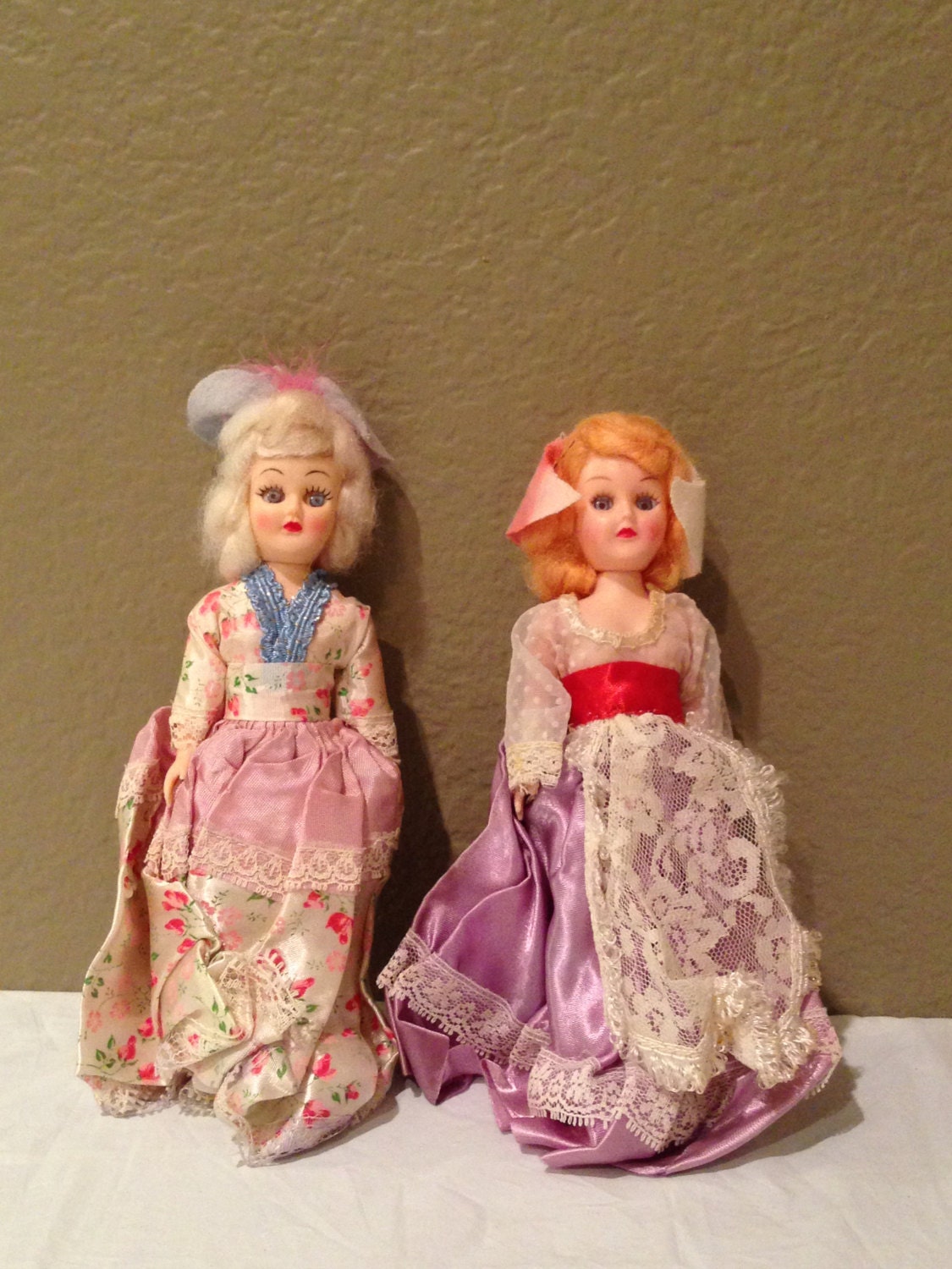 old small plastic dolls