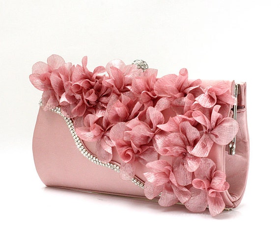 blush coloured clutch bag