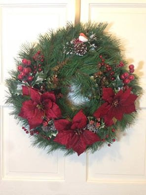 Lush green wreath with big red flowers & berries