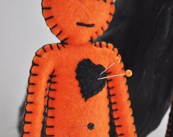 orange voodoo doll