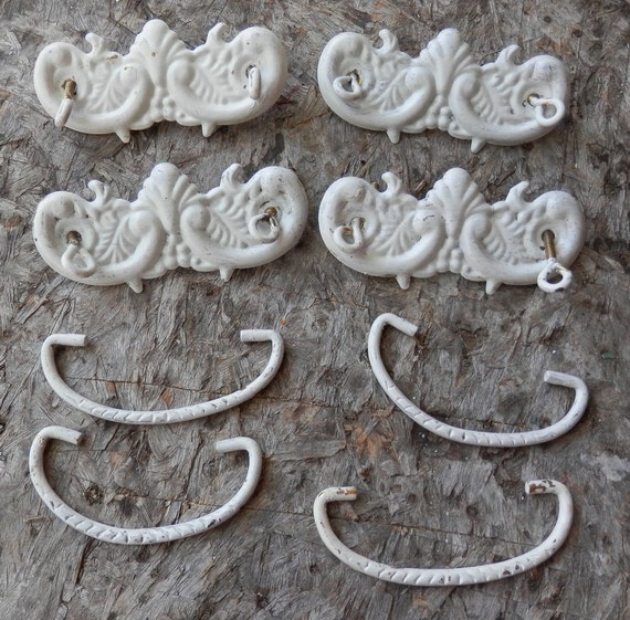 Set of 4 matching vintage drawer pulls with a by BandCEmporium