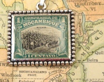 Vintage Mozambique Canceled Postage Stamp Pendant Necklace Key Ring