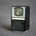 What is on telly tonight. Vintage Vienna souvenir black TV viewer.