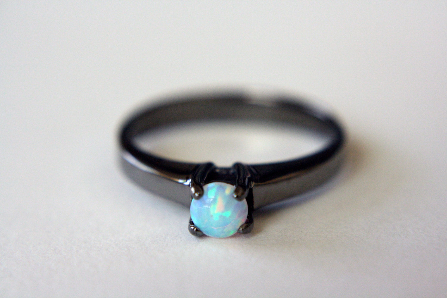 Diamond engagement rings with opal accents