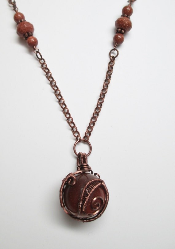 Wire Wrapped Goldstone Orb Necklace in Antique Copper