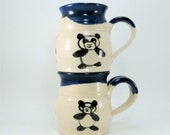 pair of panda mugs sold together