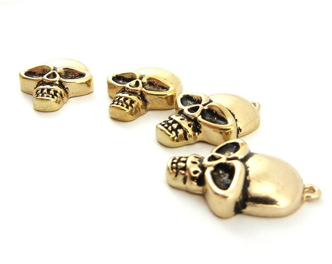 Set of 4 Antique Gold-tone Skull Head Charms