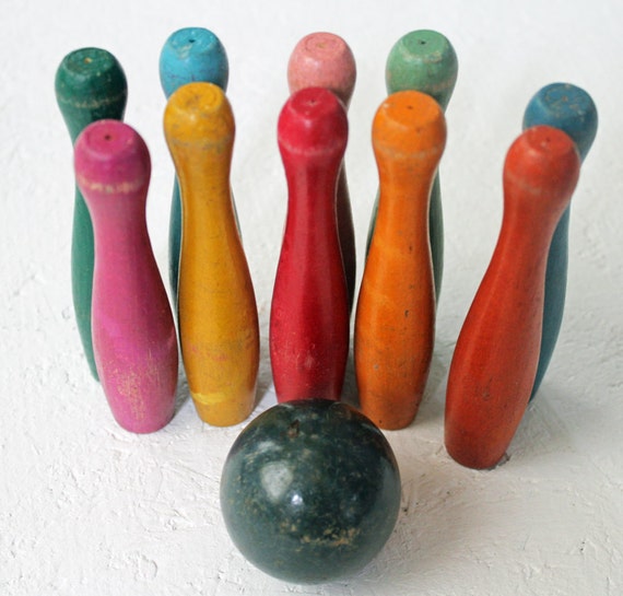 Set of Wooden small bowling pins and bowling ball game