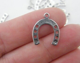12 Horseshoe charms antique silver tone A568