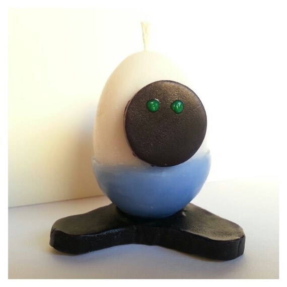 Items similar to Egg shaped candle with blue swimming trunks and dark