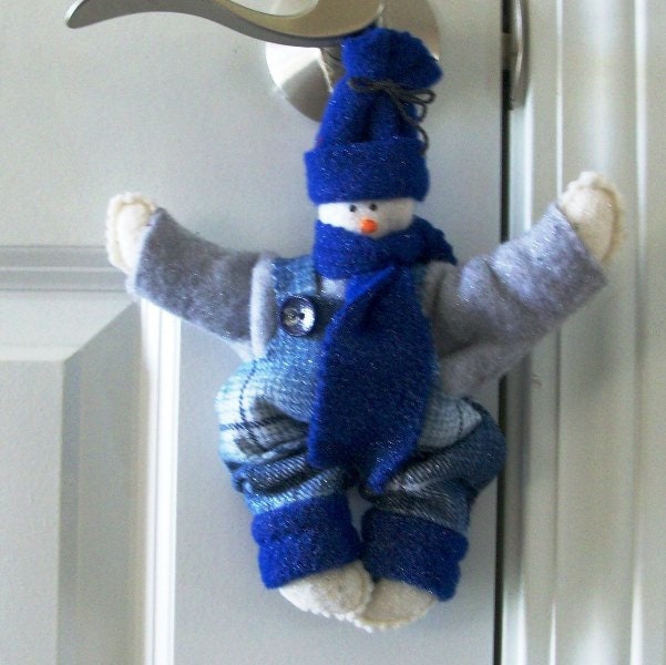 Handmade Christmas Ornament Snow man boy with cobalt and blue and white plaid jumper, gray shirt, hat, and scarf