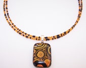 Orange and black seed bead necklace glass pendant necklace