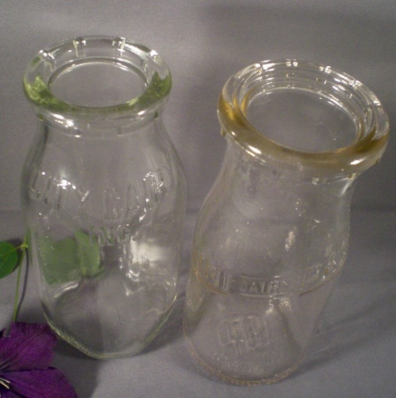 Vintage Embossed Milk Bottles Jackson Michigan by BadCatBoutique
