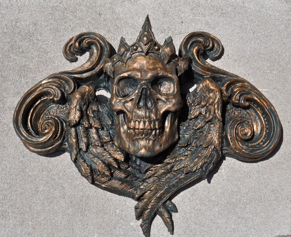 https://www.etsy.com/listing/75162116/queen-calavera-wall-plaque-bronze-finish?ref=shop_home_active_21