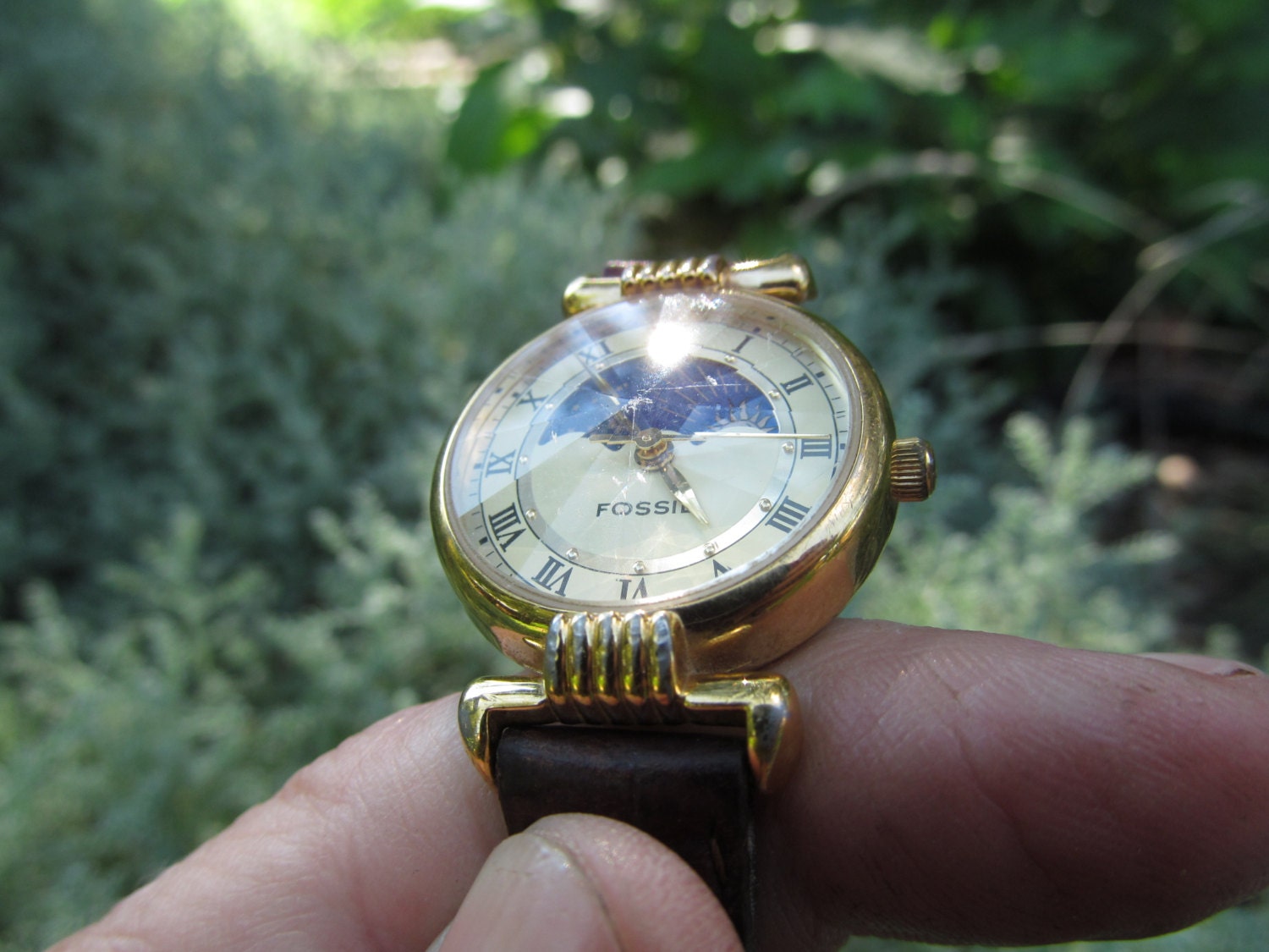 Vintage sun and moon Fossil watch with faceted crystal