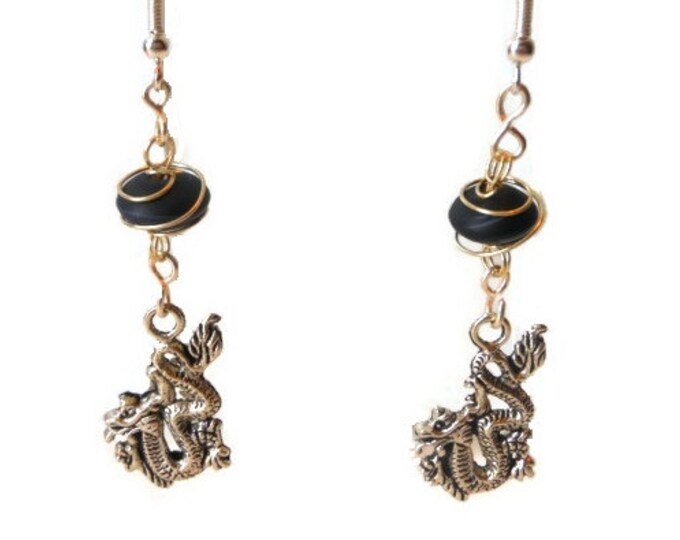 Wire wrapped dragon earrings of Tibetan silver handmade with silver plated wire and caged black frosted glass beads