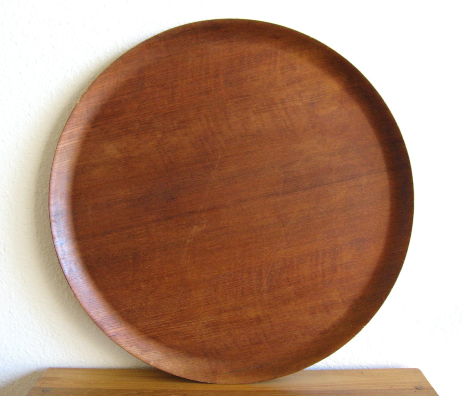 large circular wooden tray