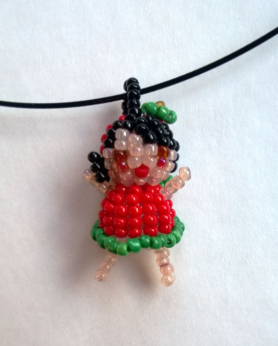 Items similar to Strawberry Girl Seed Bead Doll Beaded Bead Pendant