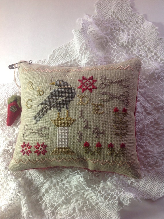 Hand stitched primitive pincushion bowl filler with blackbird
