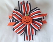 Items similar to Halloween trick or treat pumpkin hair bow on Etsy