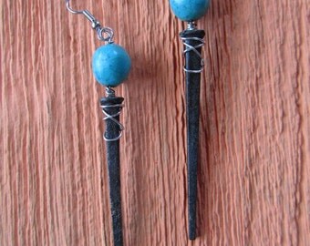 Earrings made with old forged nails
