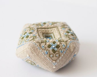 Pin cushion biscornu with cross stitch flowers