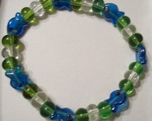 Popular items for glass fish beads on Etsy