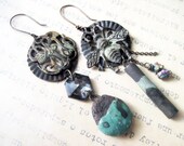 The Hidden Meaning. Vintage antique oxidized metal charms with rustic ceramic art dangles. dark asymmetrical earrings.