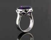 Sterling Silver Ring set with oval facet cut Purple Amethyst