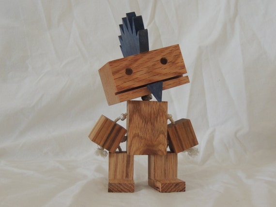 Wooden robot with a Mohawk.....and a soul patch.