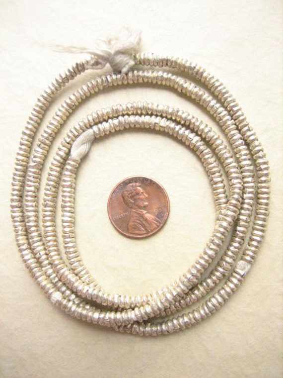 African Silver Heishi Beads