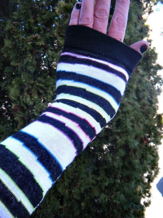 Black and white stripe print arm warmers with neon pink