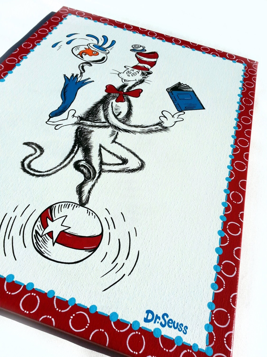 Dr Seuss hand painted canvas cat in the hat balancing on