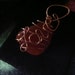 Carnelian stone wrapped in copper wire Reiki Charged Pendant