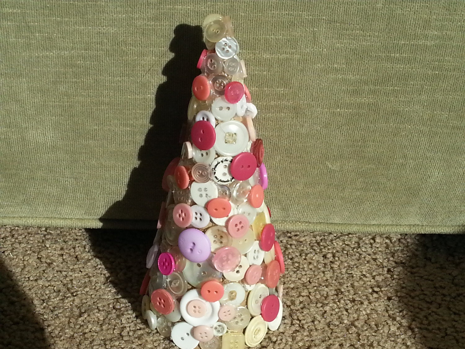 Handmade decorative multi colored pink white and cream new and vintage button Christmas tree