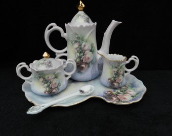 Tea Service: Hand decorated porcelain