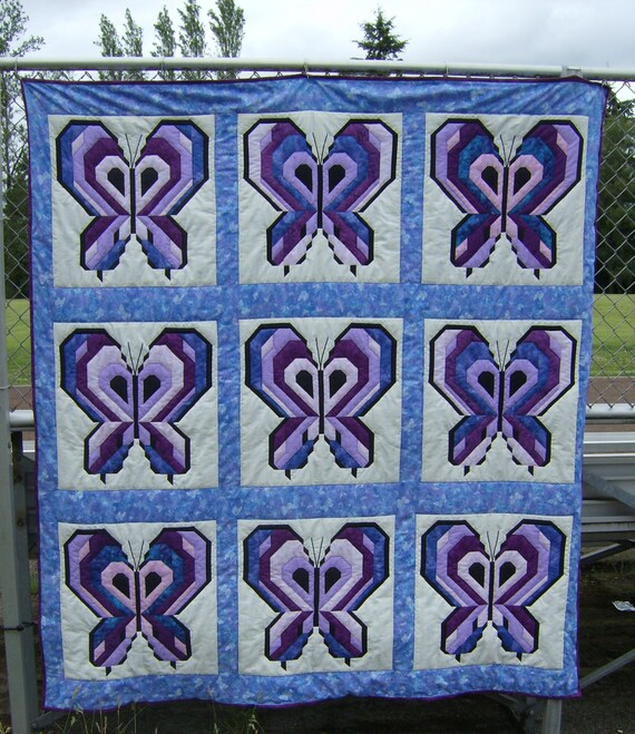 a beautiful purple butterfly quilt for a twin bed by LanethsQuilts