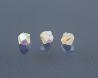 Crystal AB 2X~4 mm Xillion Bicone (5328) Genuine Swarovski crystals. (24)