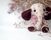 Toy violet elephant. Cloth art fabric doll.
