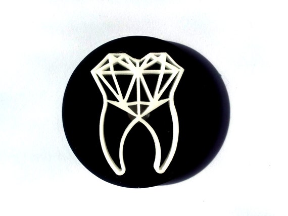 Items similar to Geometric White Tooth on Black Round Acrylic Brooch