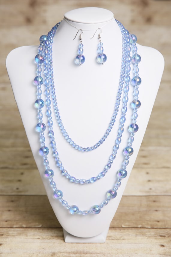Items similar to Iridescent Blue Glass Necklace and Earrings Bead