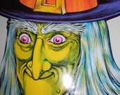 c-1973 The Beistle Co Made in USA Green Faced Pink Eyed Wicked Witch Cardboard Halloween Decoration c-1973 The Beistle Co Made in USA Green Faced Pink Eyed Wicked Witch Cardboard Halloween Decoration