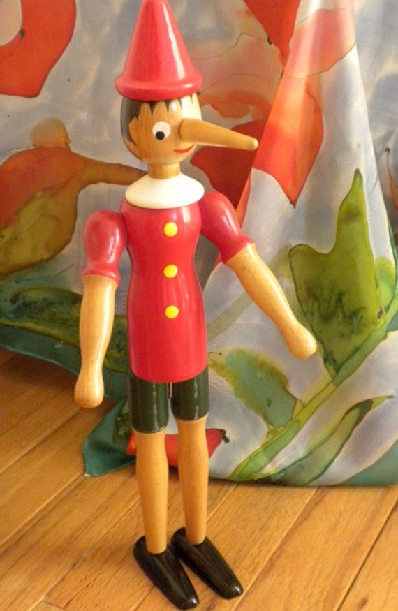 enchanting disney little wooden head pinocchio figurine