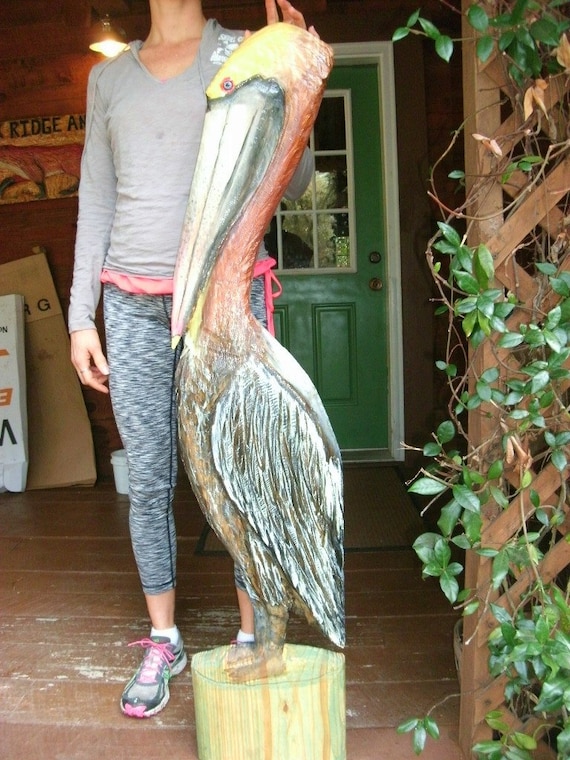 Pelican on the Pier 4ft. chainsaw carved saltwater by oceanarts10