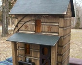 Primitive Lighted Log Cabin Folk Art stained w/ dark green accents ~  Comes w/ light and cord ~  Birdhouse ~  Very unique!