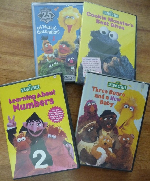 Four Sesame Street DVDs. Educational entertaining and fun.