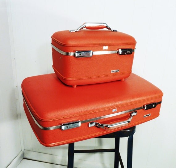 bright red vintage american tourister suitcase luggage