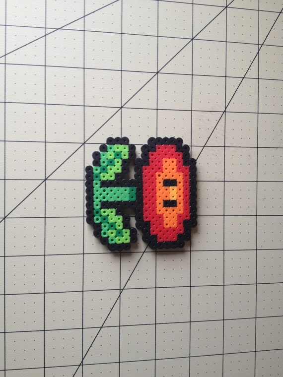 Items similar to Super Mario Bead Sprite - Fire Flower on Etsy