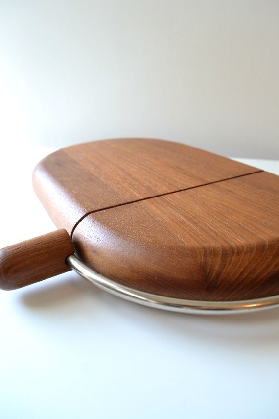 Vintage cheese slicer board.